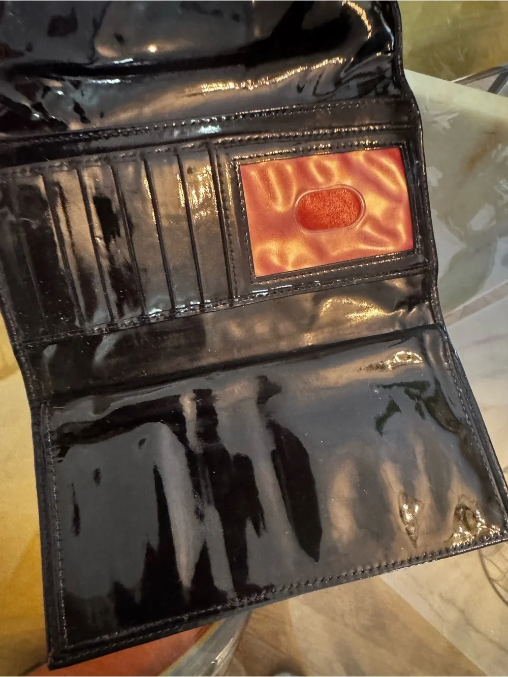 Dooney & Bourke Brown Logo Continental Wallet with Black Strap and Gold Hardware
